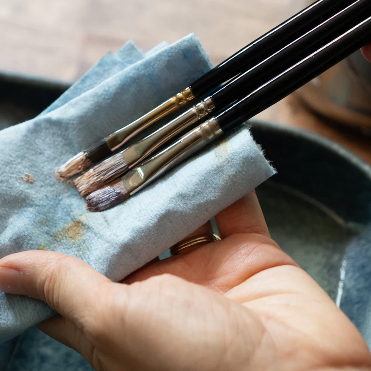 Savvy brush tray cradling brush bristles to protect them between uses, product design by Spitfire