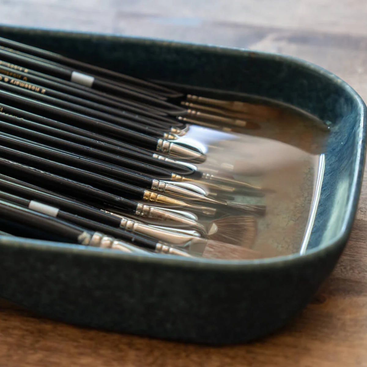 Savvy brush tray holding a full set of paintbrushes, high-capacity art-supply product design by Spitfire