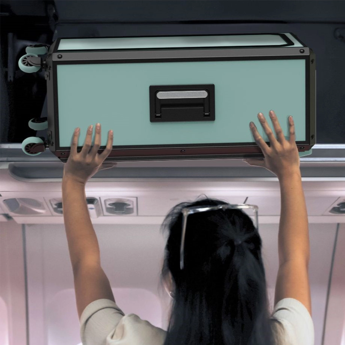 Revival cases lifted into an overhead bin, showing the lightweight recyclable aluminum build