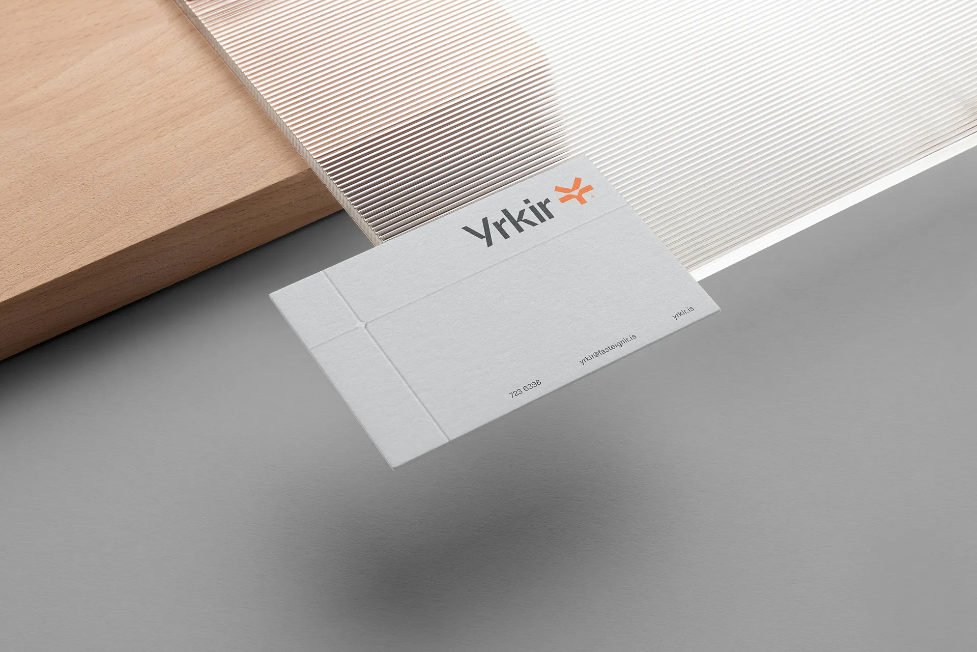 A single business card mockup with the logotype of Yrkir on it