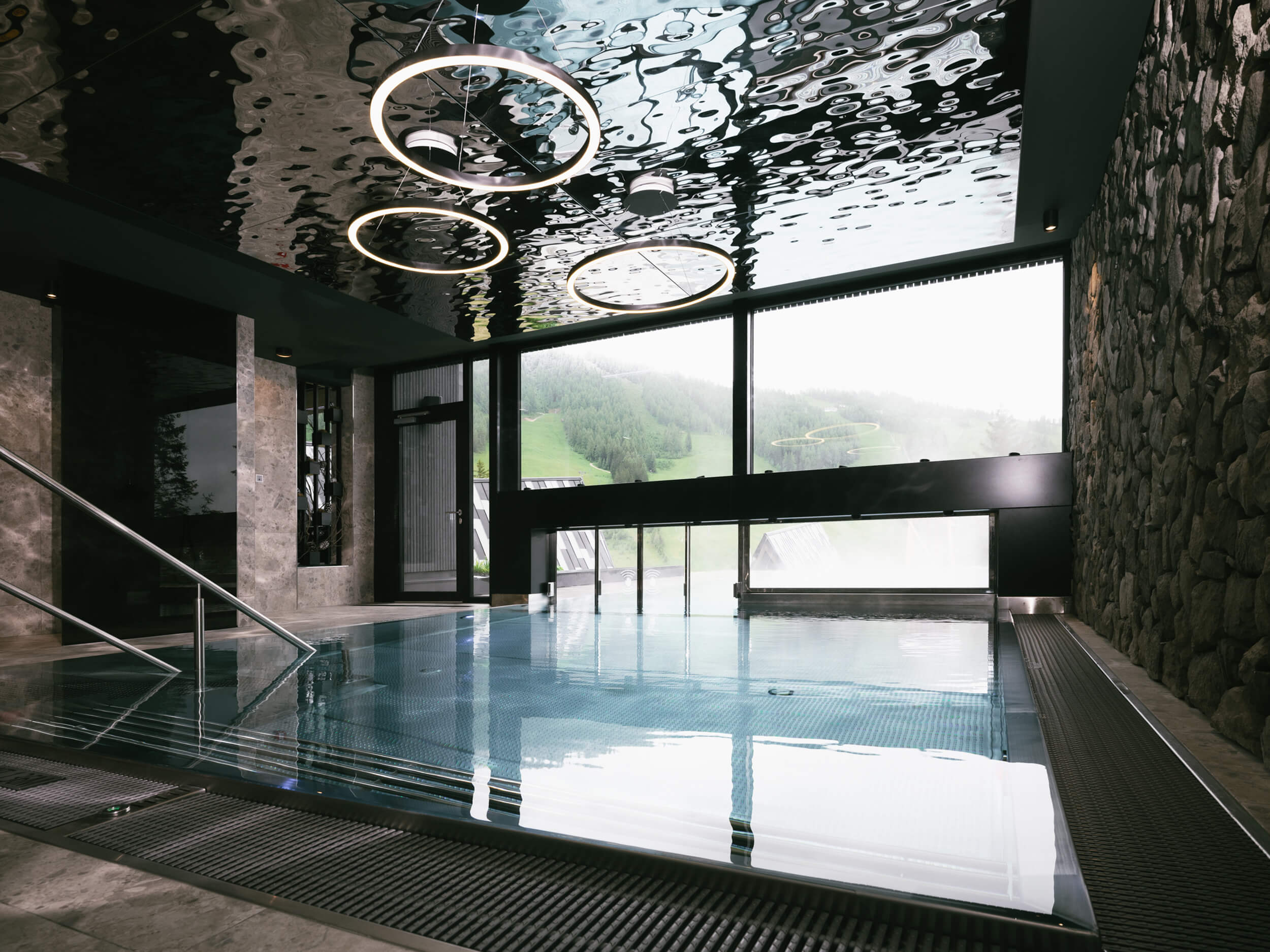 Infinity pool at TRIFORÊT alpin.resort stay