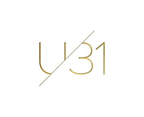 Stylized text 'U31' split diagonally by a line with gold-colored letters on white background.