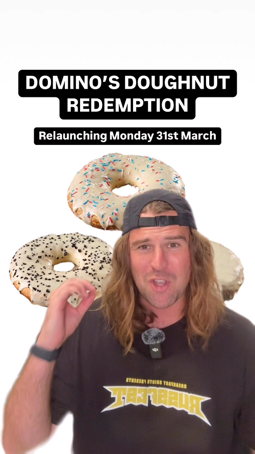 Two Red Yolk influencers holding Domino's Pizzas