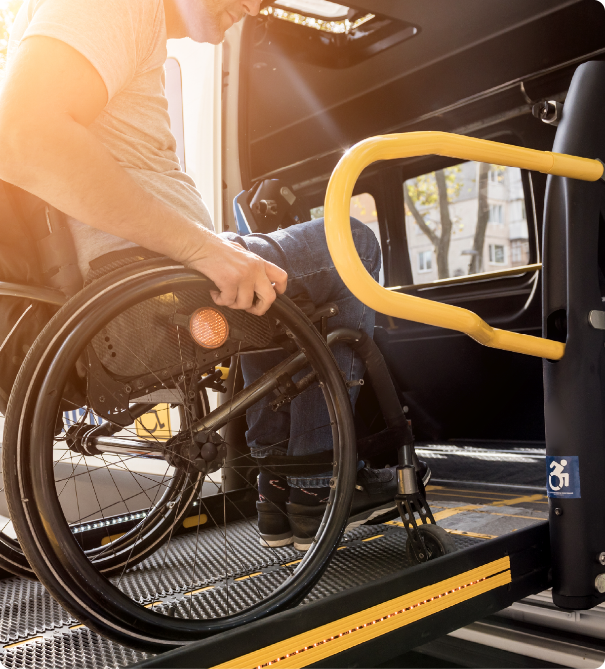 EPH Image: Wheelchair entering vehicle using a ramp