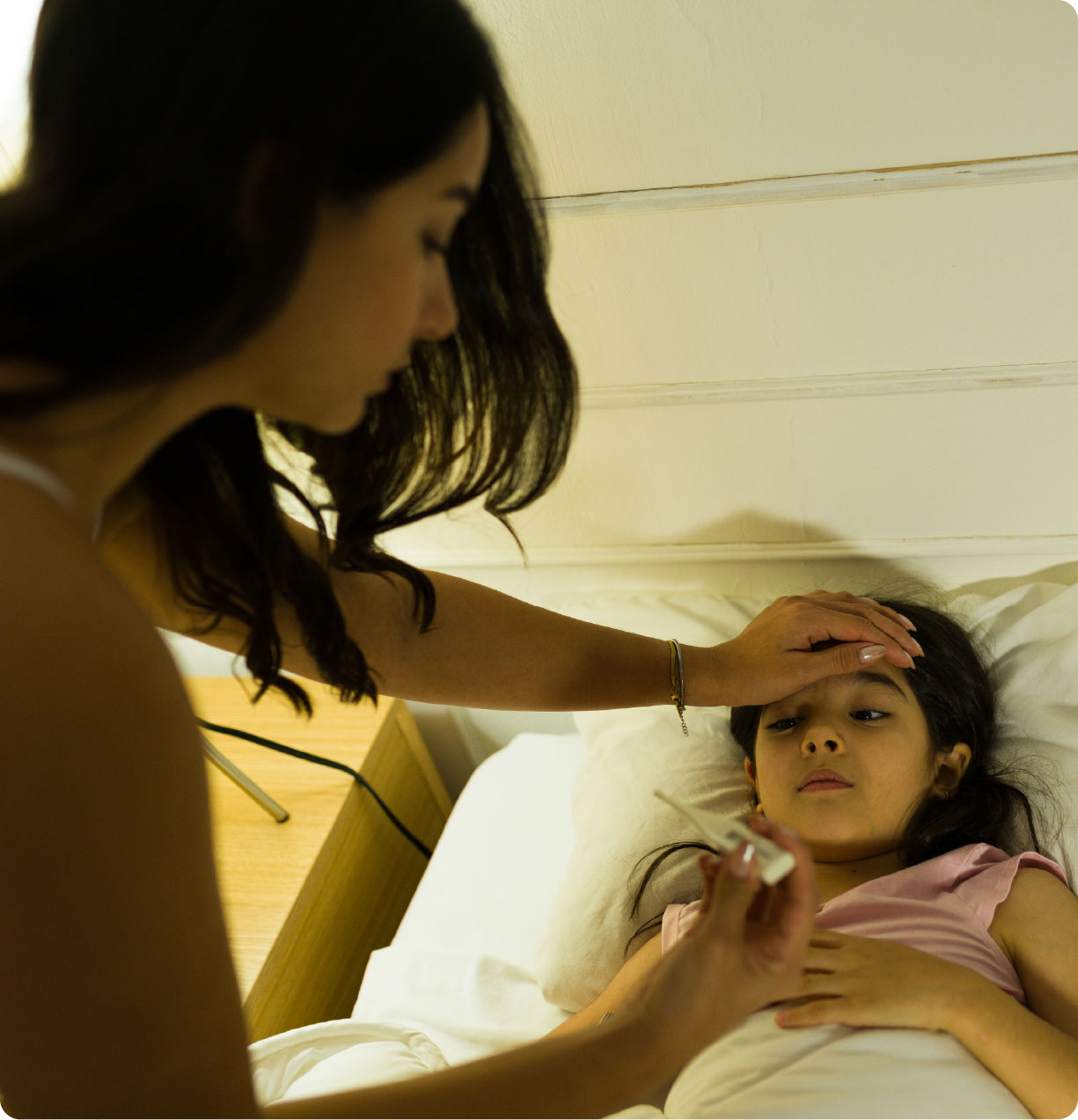 EPH Image: Mom checking daughter's temperature