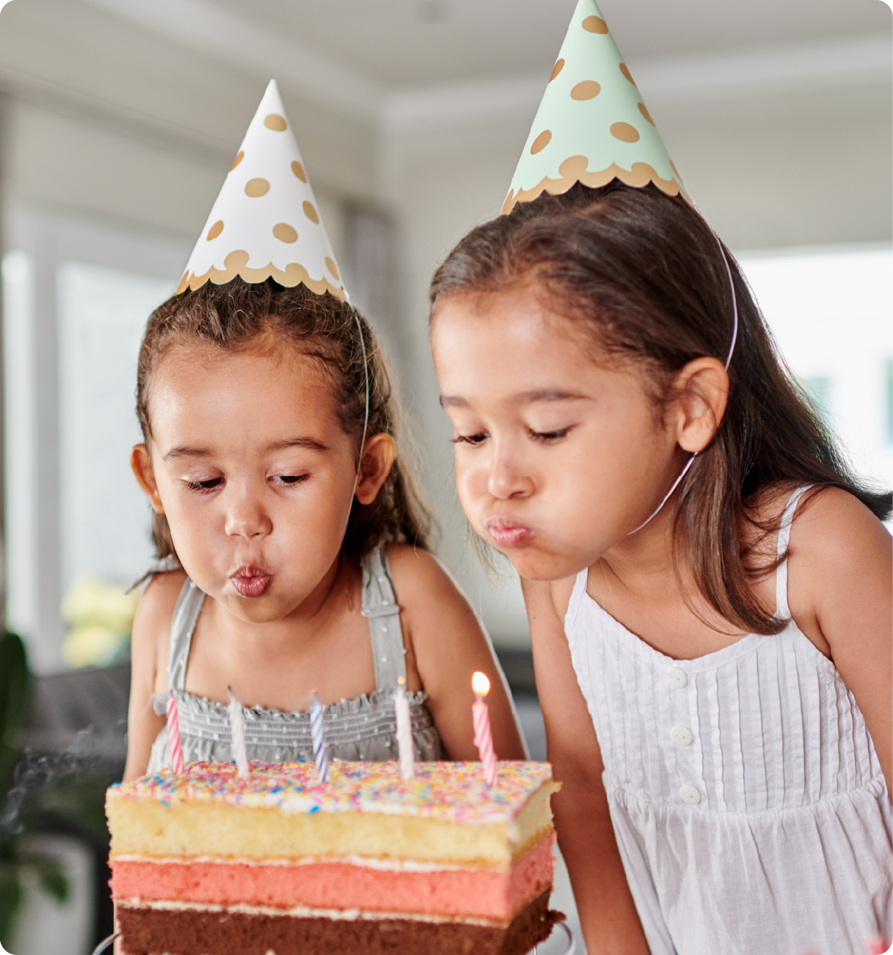 EPH Image: Little girls blowing out birthday candles