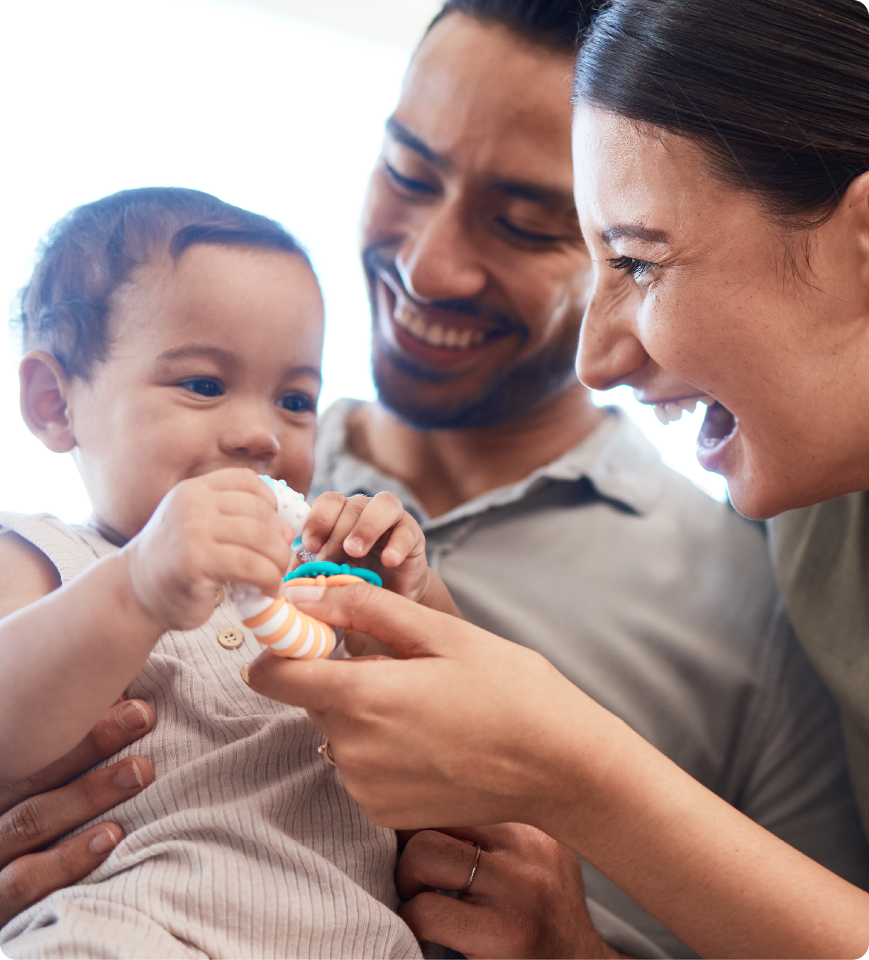 EPH Image: Mom and Dad playing with Baby