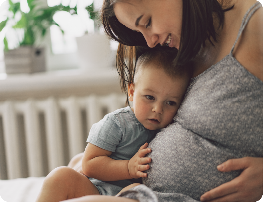 EPH Image: Pregnant mom and baby sitting together