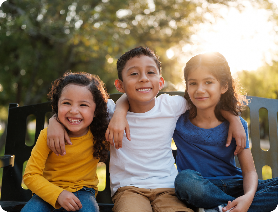 EPH Image: 3 children sitting on a bench on a farm