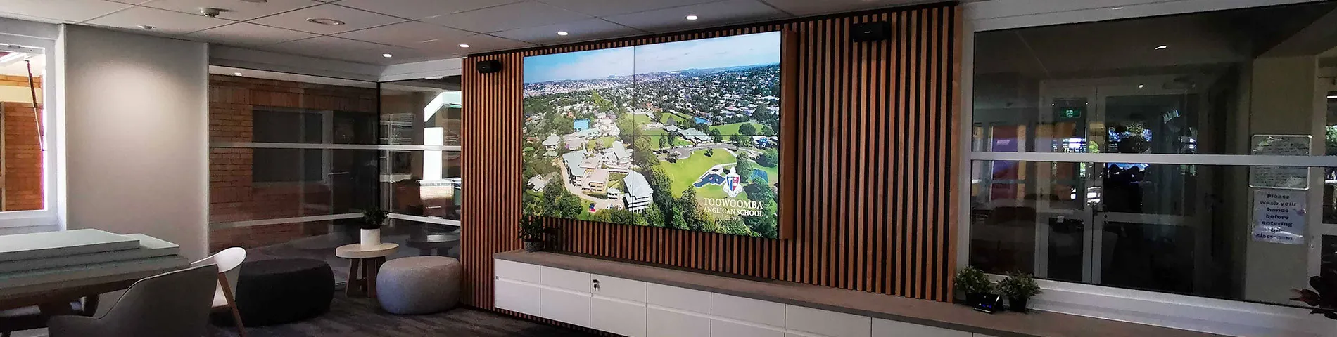 A room with a large LED wall 