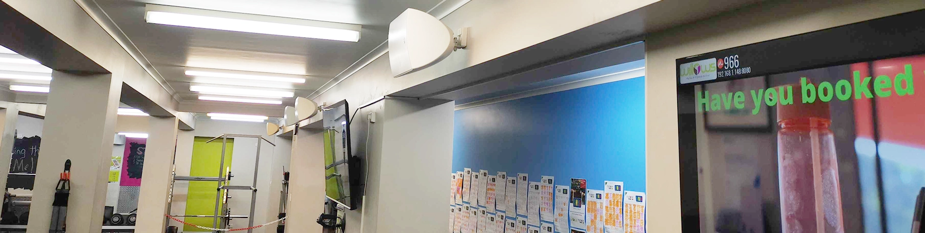 A hallway with a large poster on the wall.