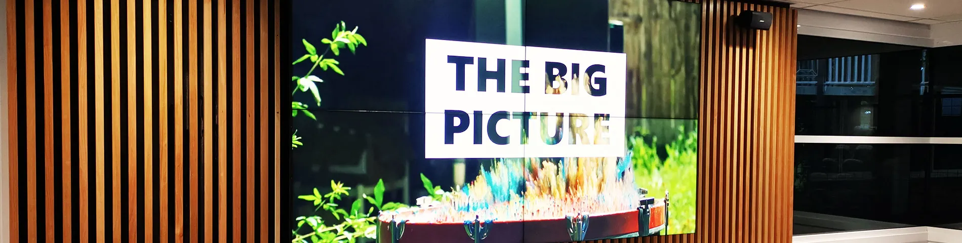 A sign that is on the wooden wall