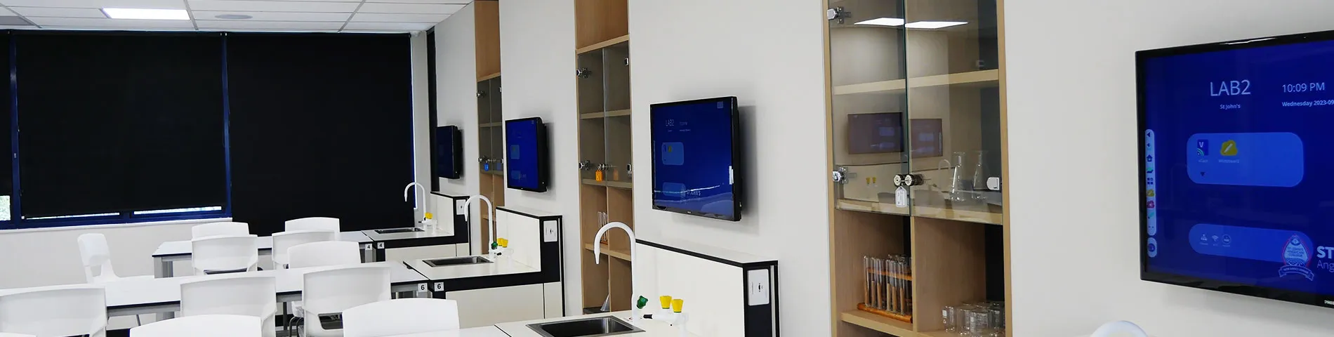A large flat screen tv mounted to the side of a wall.