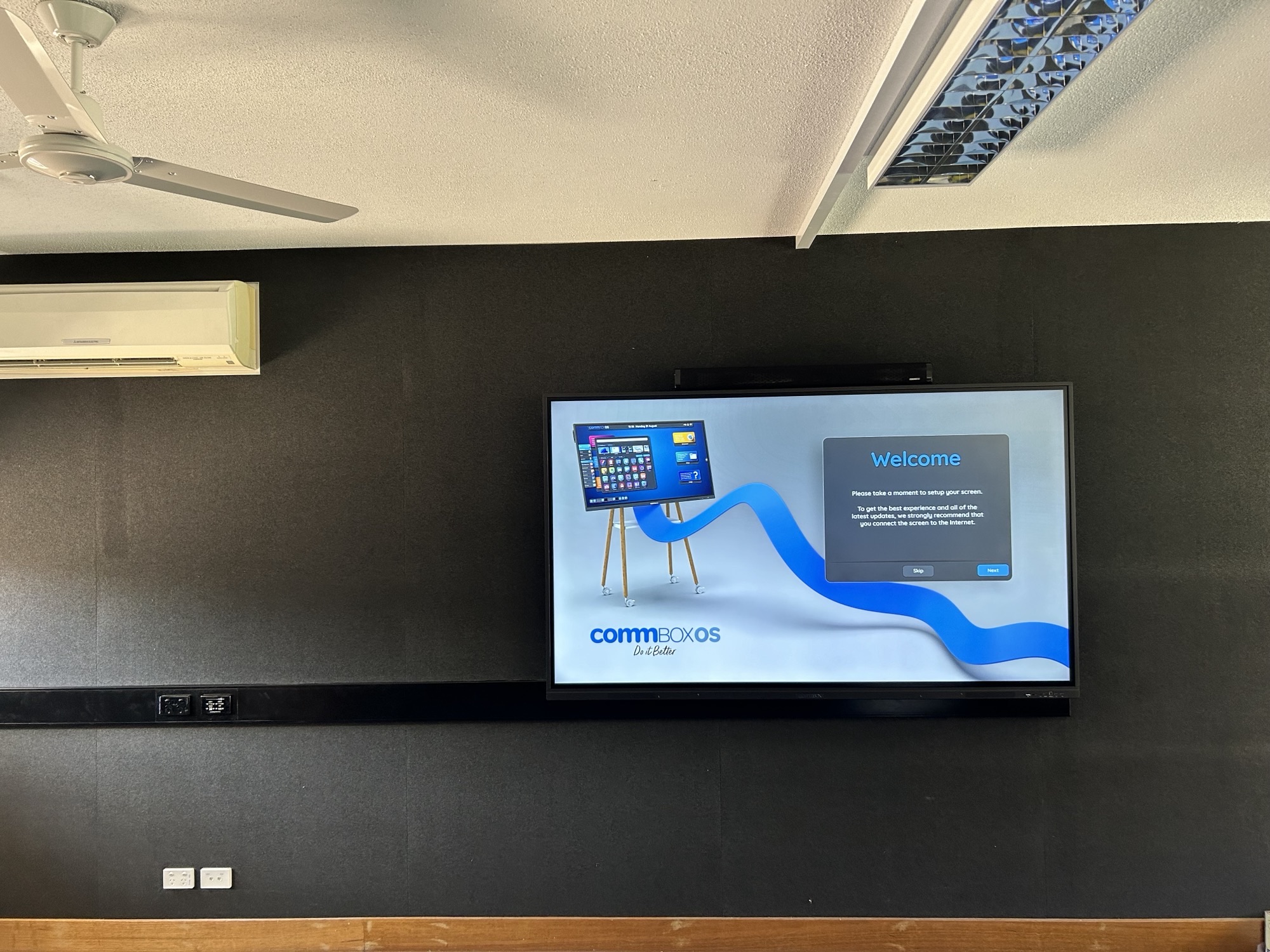  Wall mount large screen TV on right side of the room