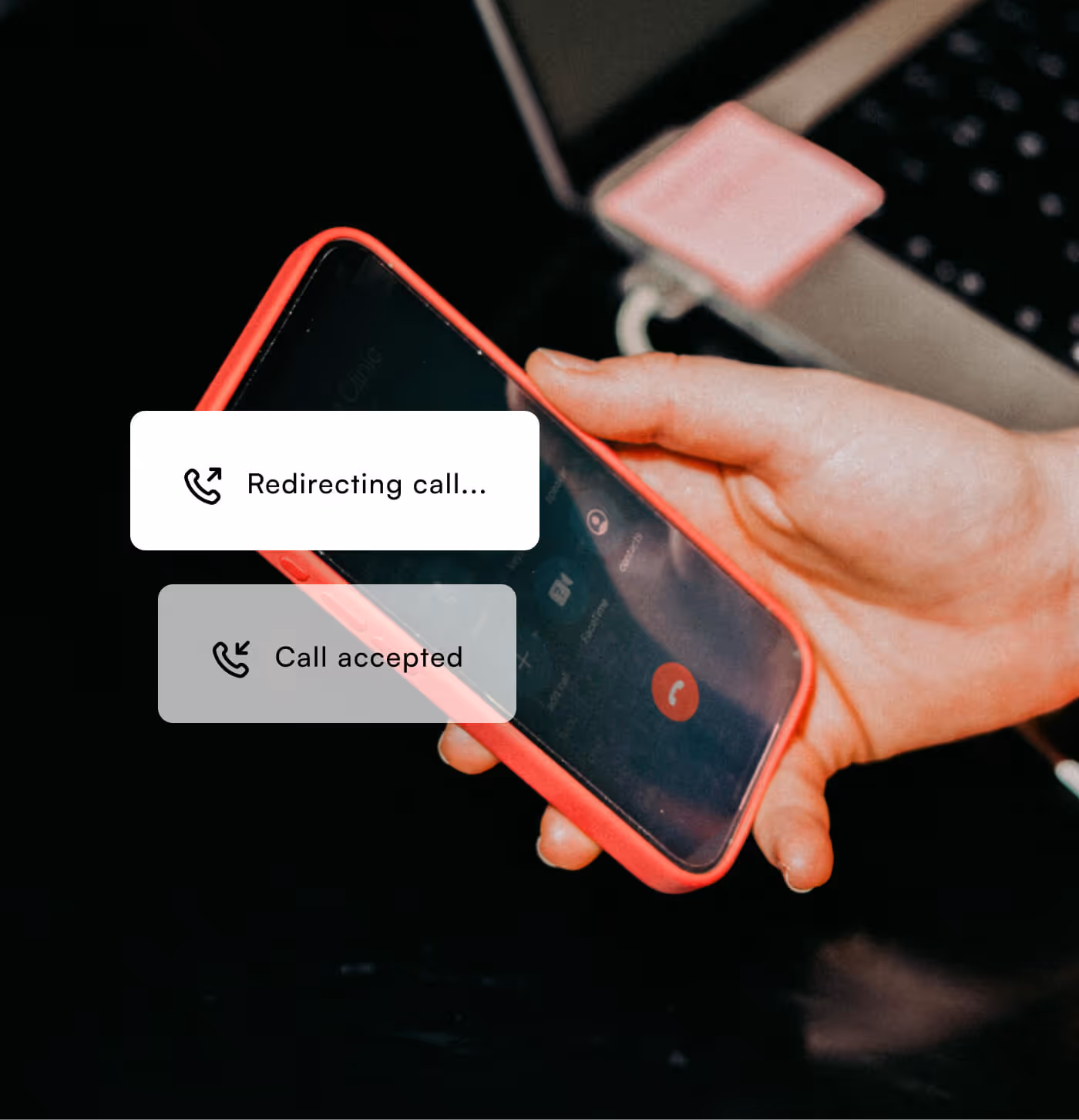 Hand holding a smartphone with call status messages: Redirecting call and Call accepted.