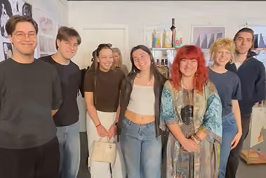 Group picture with students and their teacher.