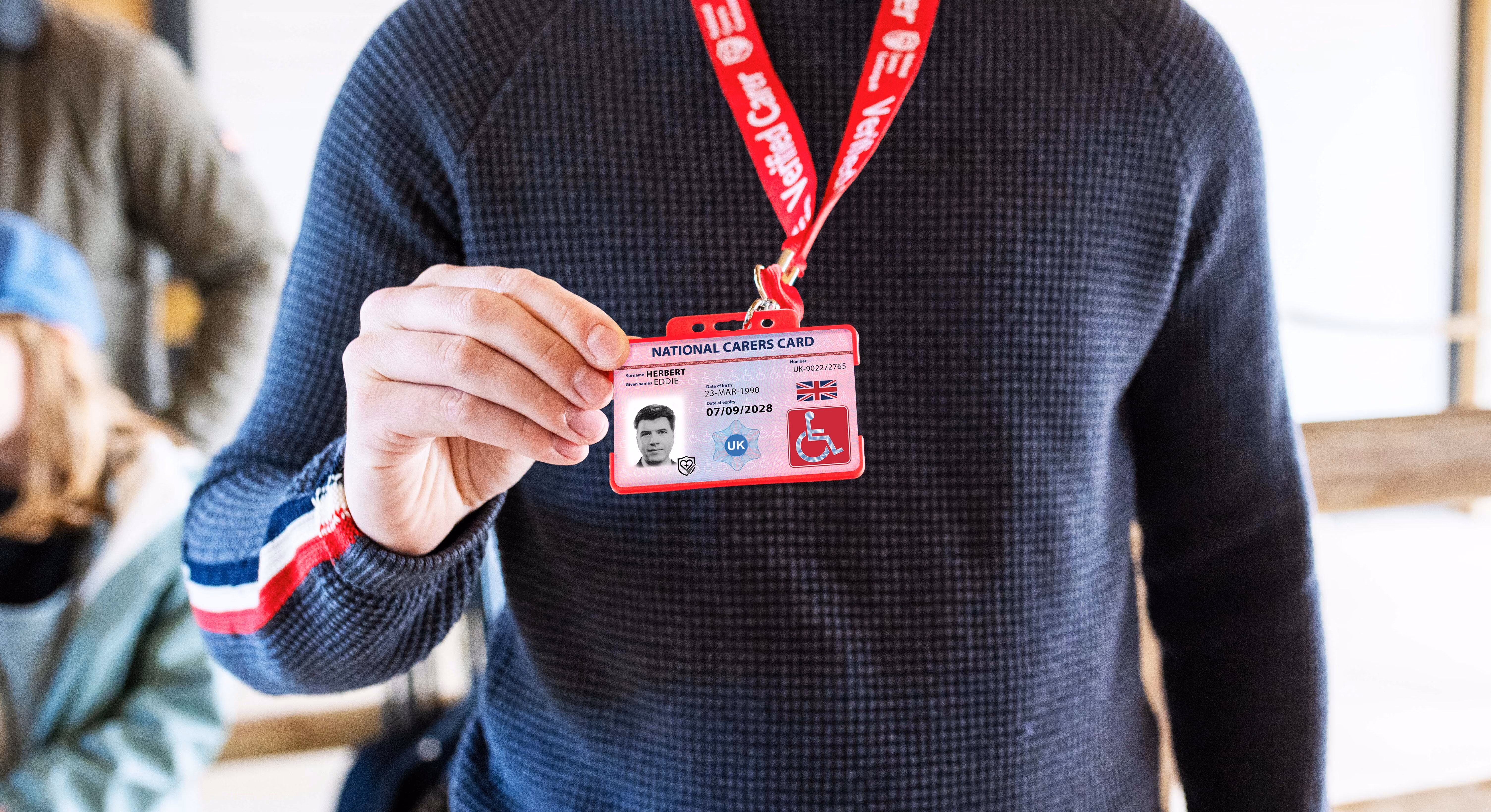 national disability card holder showing her card at a venue for carer ticket access
