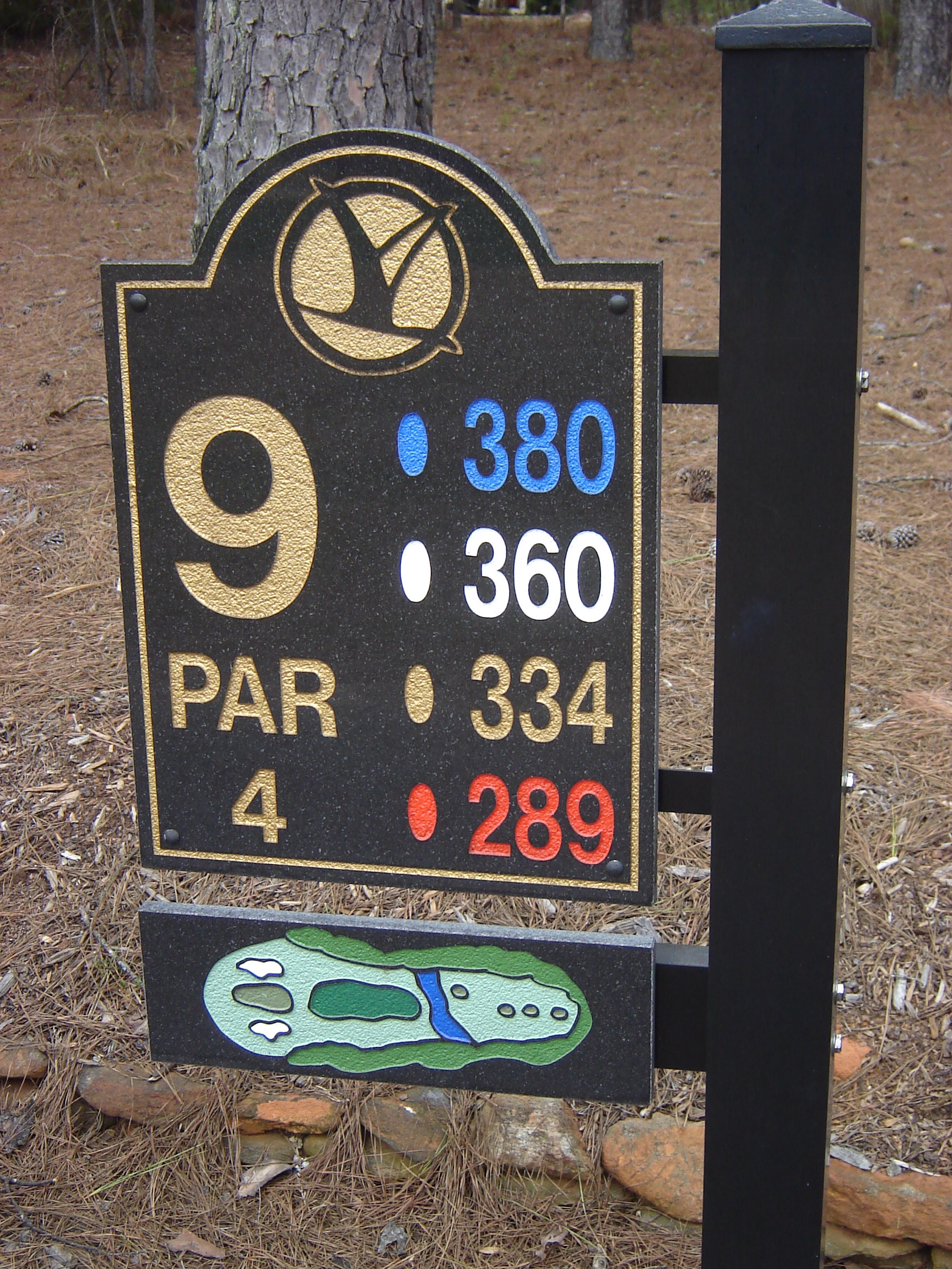 carved black granite tee sign