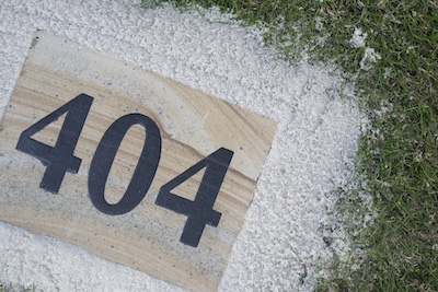 carved sandstone yardage marker