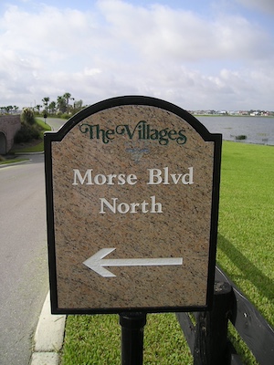 beige granite directional sign