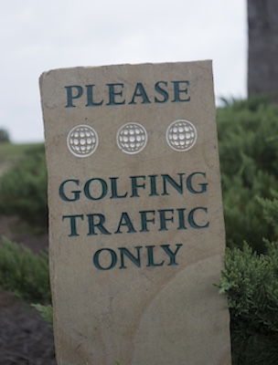 carved sandstone pillar cart sign 