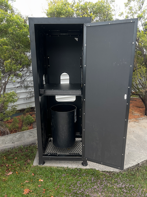 black metal frame water cooler holder with trash storage underneath