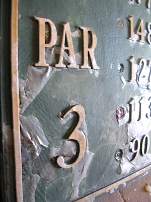 crusty old cast bronze sign