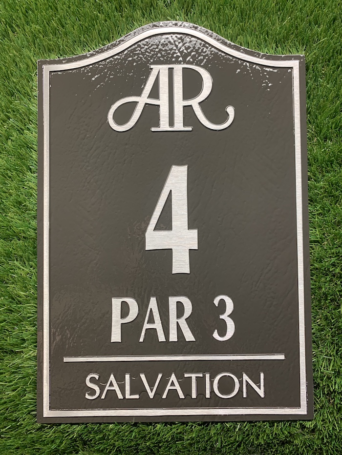 cast bronze tee sign