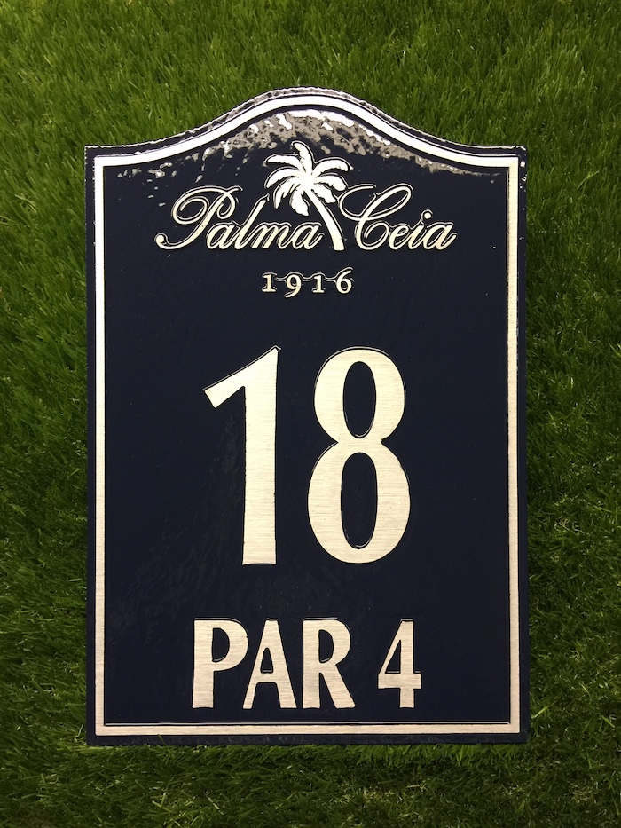 cast bronze tee sign