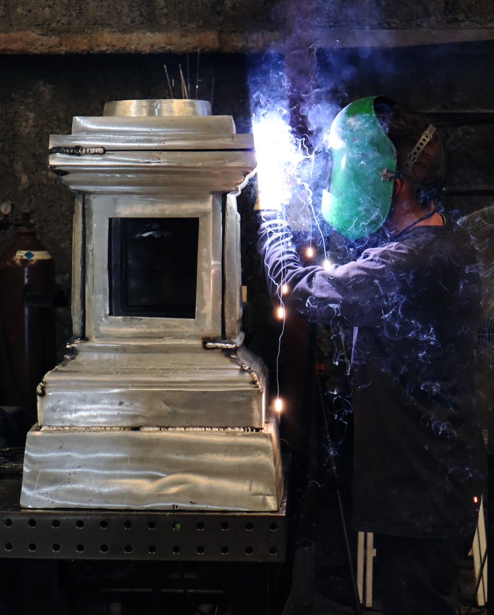 welder welding a clock