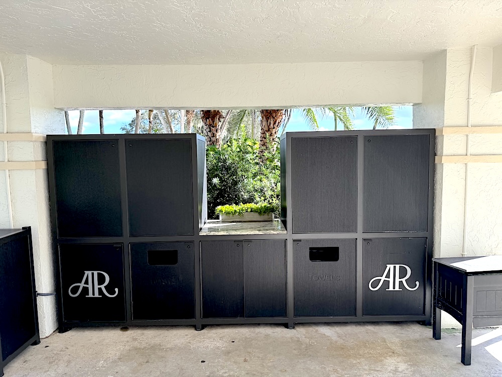 custom amenity station with aluminum logos, closed
