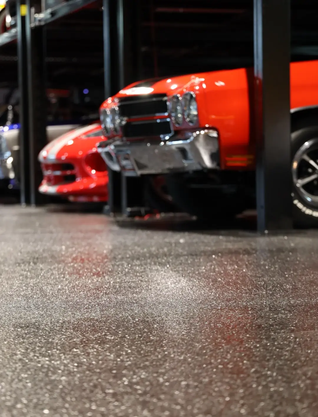 close up of cars lined up in auto shop