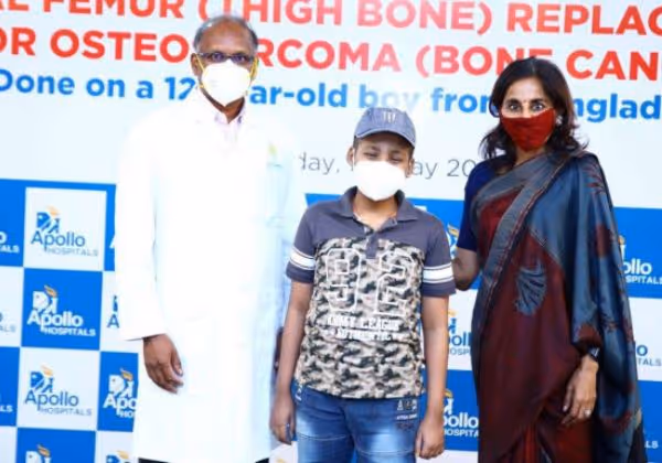 Doctors with a 12-year-old Bangladeshi boy at Apollo after total femur replacement surgery for bone cancer