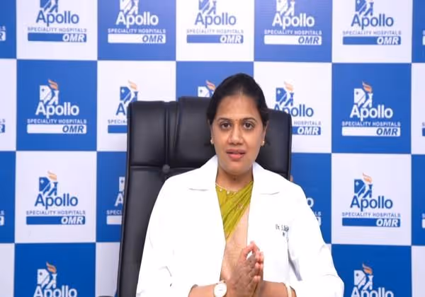 Doctor at Apollo Hospitals explaining the importance of vitamin supplements during pregnancy.