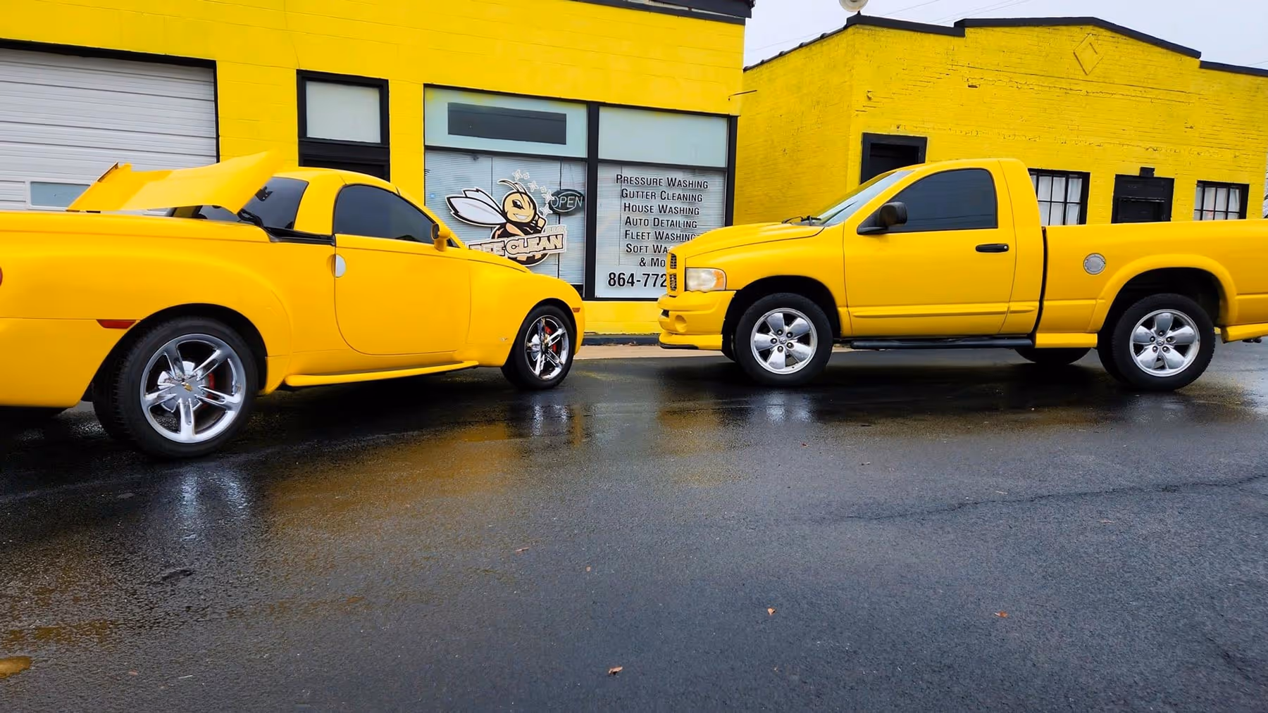 Yellow trucks outside of Bee Clean office.