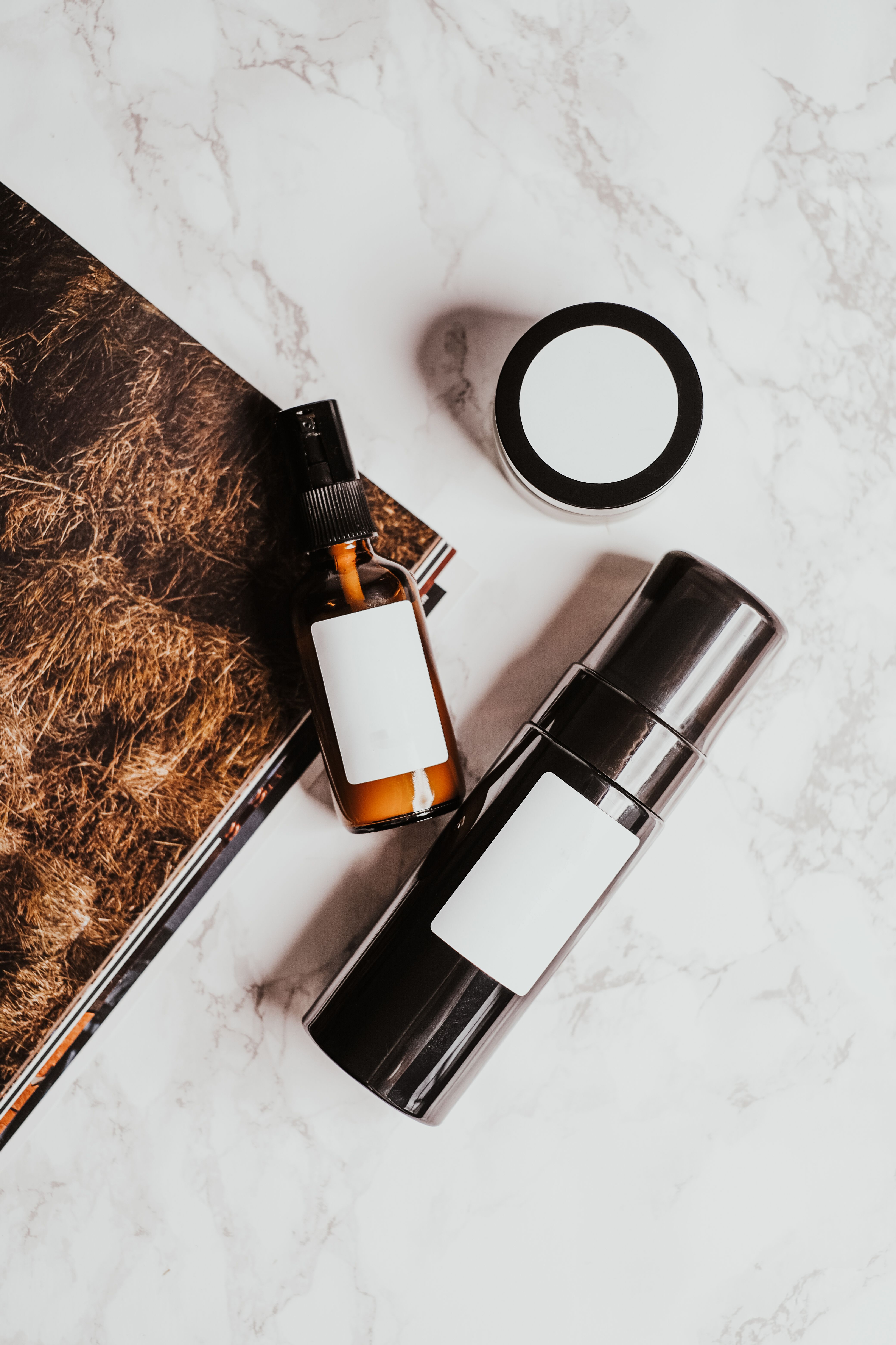 Skincare and cosmetic products representing Cosmetic Safety Data Sheet (SDS) authoring services.
