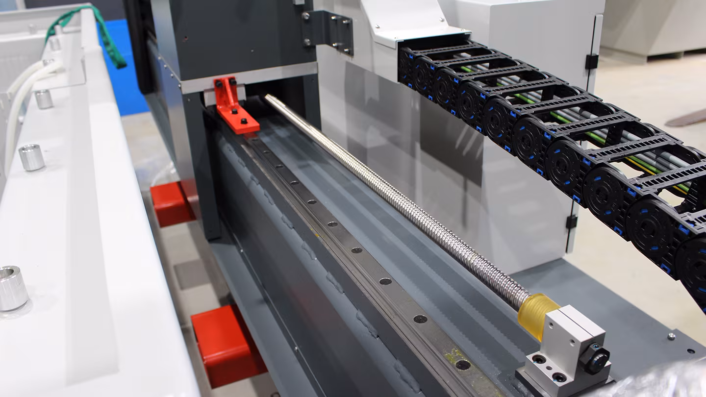 Close-up view of a water jet cutting system motion control system