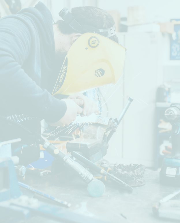 A man working on a piece of equipment.