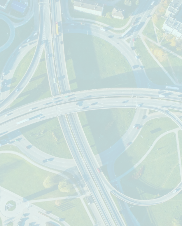 An aerial view of a highway intersection with multiple lanes.