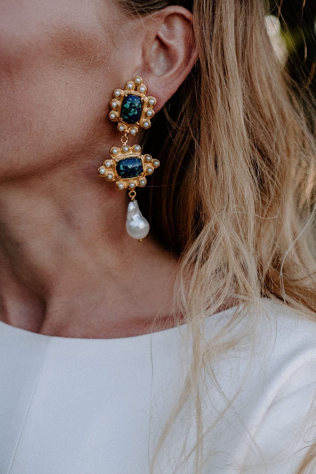 Close-up of a bride's ornate jewelled drop earring