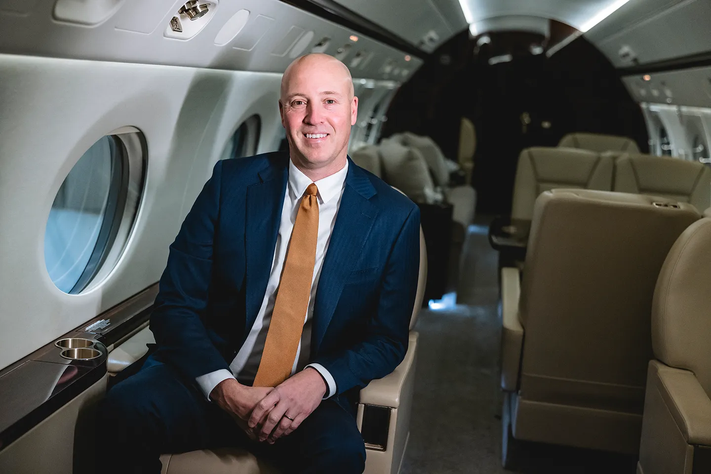 Mike Mikolay - Michael Mikolay sitting in business jet - CEO of Mikolay Jet Group