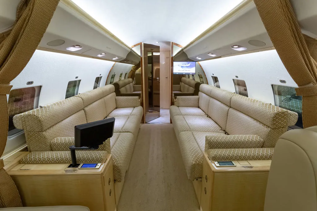 2002 Bombardier Global Express N983J S/N 9072 - interior aircraft - aft, couches with monitor at seat
