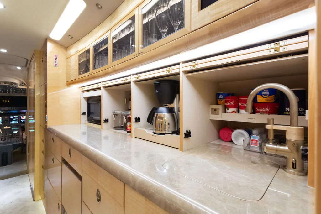 v2002 Bombardier Global Express N983J S/N 9072 - interior aircraft - galley open cabinets closeup
