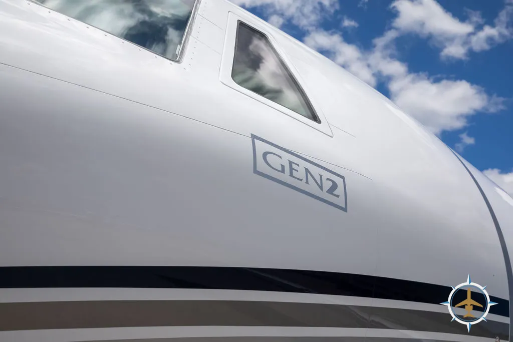 2024 Cessna Citation XLS Gen2 S/N 560-6360 - exterior of white and blue aircraft for sale, close up of Gen2 logo, Mikolay Jet group logo