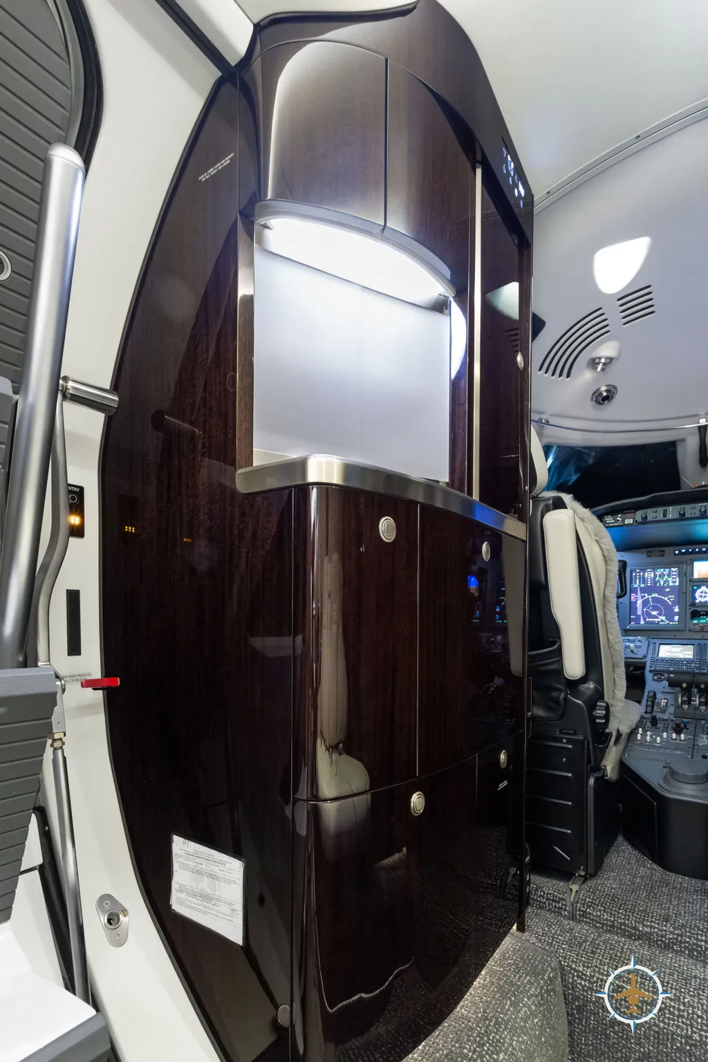 2024 Cessna Citation XLS Gen2 S/N 560-6360 - exterior of white and blue aircraft for sale, interior view of the refreshment station, Mikolay Jet group logo