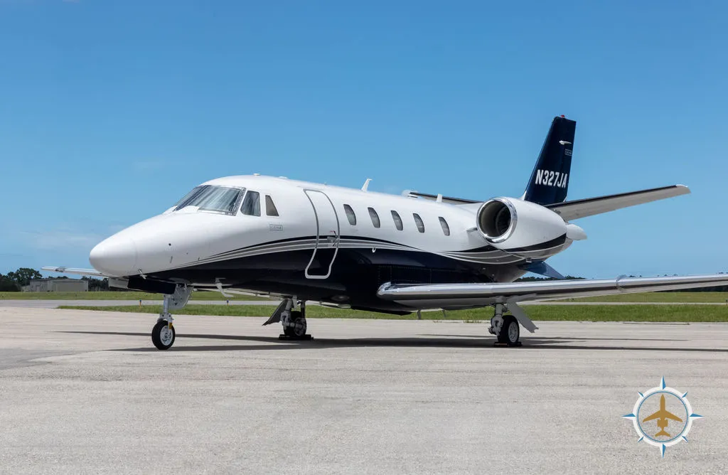2024 Cessna Citation XLS Gen2 S/N 560-6360 - exterior of white and blue aircraft for sale, parked on tarmac in daylight, Mikolay Jet group logo
