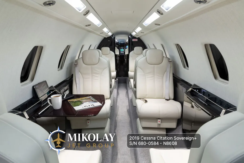 2019 Cessna Citation Sovereign+ S/N 680-0584 - interior photos of an aircraft for sale, Mikolay Jet group logo