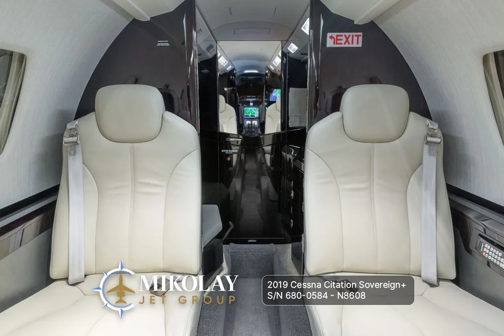 2019 Cessna Citation Sovereign+ S/N 680-0584 - interior photos of an aircraft for sale, Mikolay Jet group logo