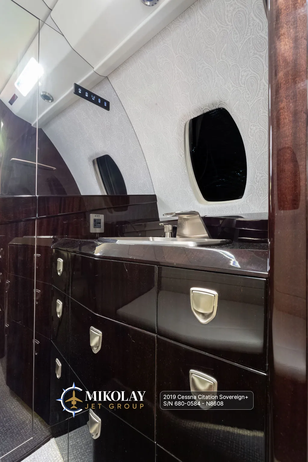 2019 Cessna Citation Sovereign+ S/N 680-0584 - interior photos of an aircraft for sale, Mikolay Jet group logo
