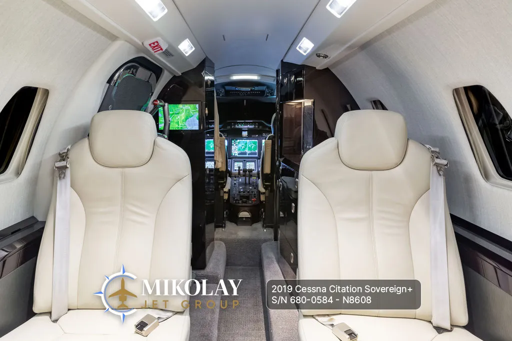 2019 Cessna Citation Sovereign+ S/N 680-0584 - interior photos of an aircraft for sale, Mikolay Jet group logo